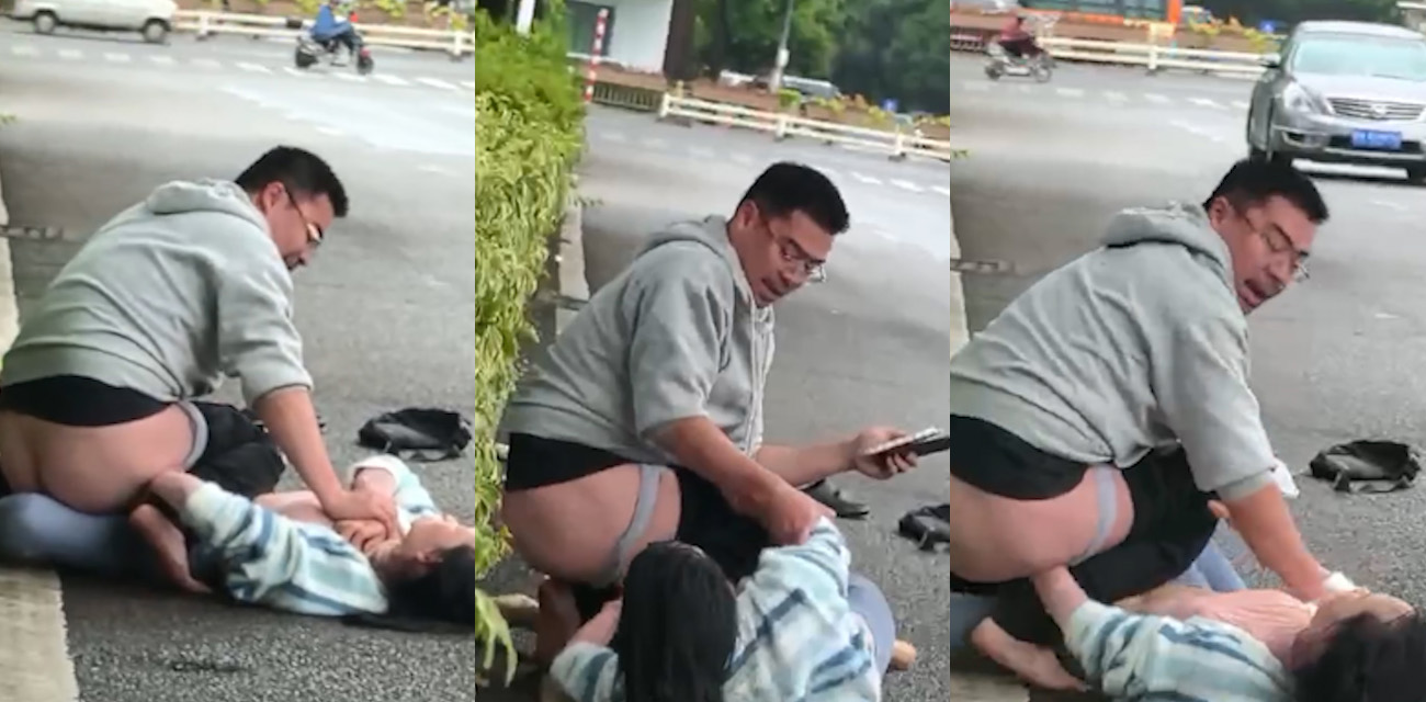 中年男子在路边被女人扒裤子 男子整个屁股都暴露在外 不雅画面被路过小伙偷拍记录